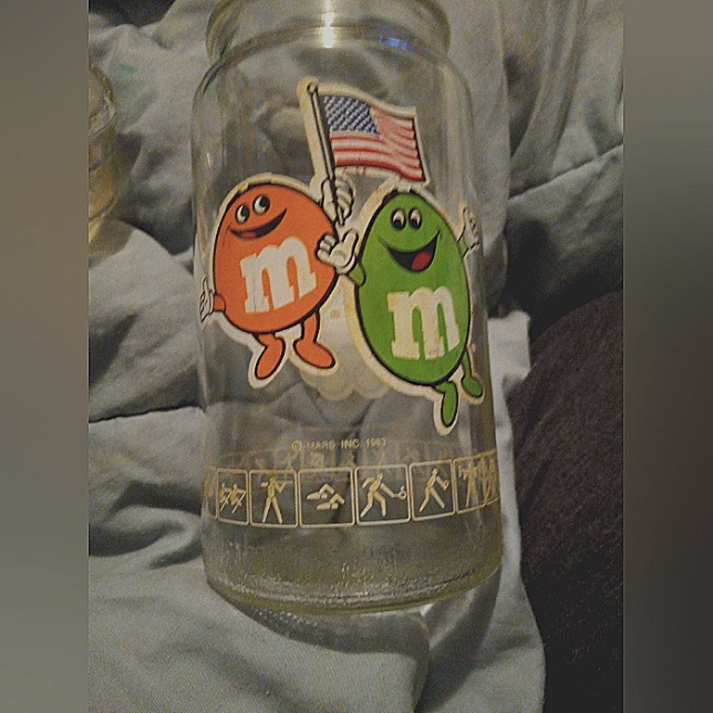 Vintage glass candy jar features M&M and Olympics Like New condition